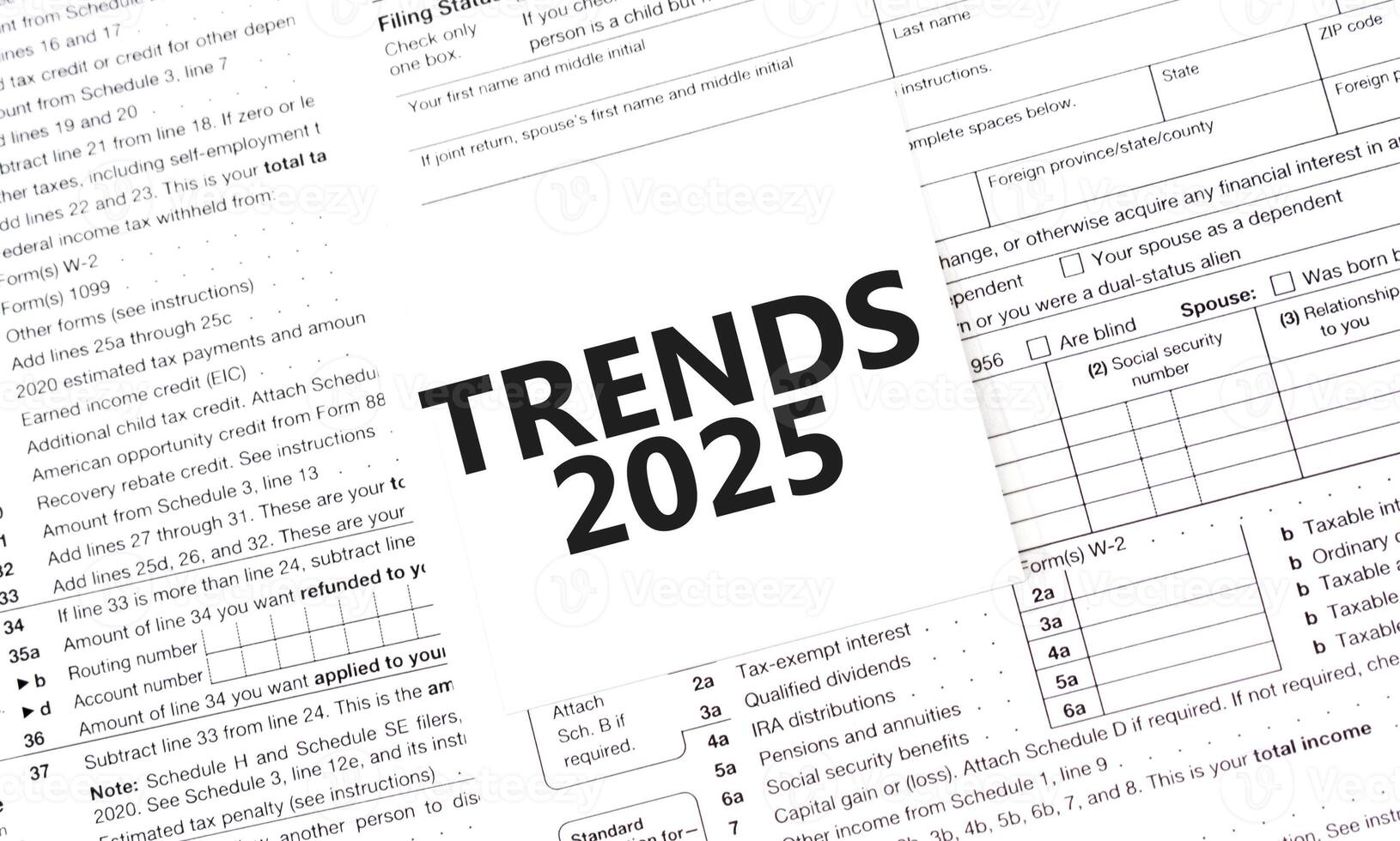 Overlay of TRENDS 2025 text on tax forms background 42585287 Stock