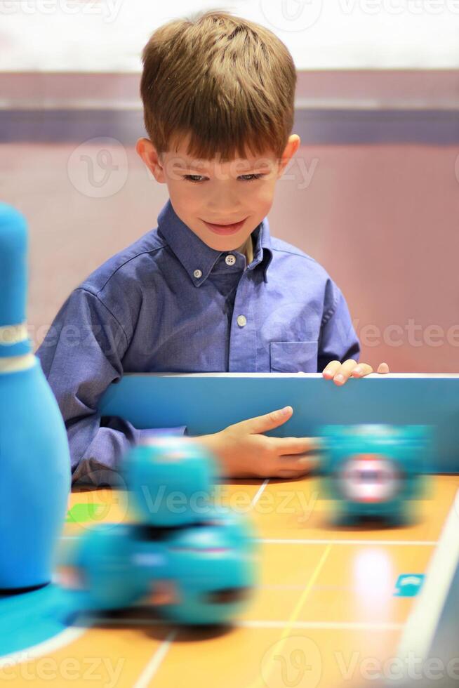 Boy at the robotics lesson. photo