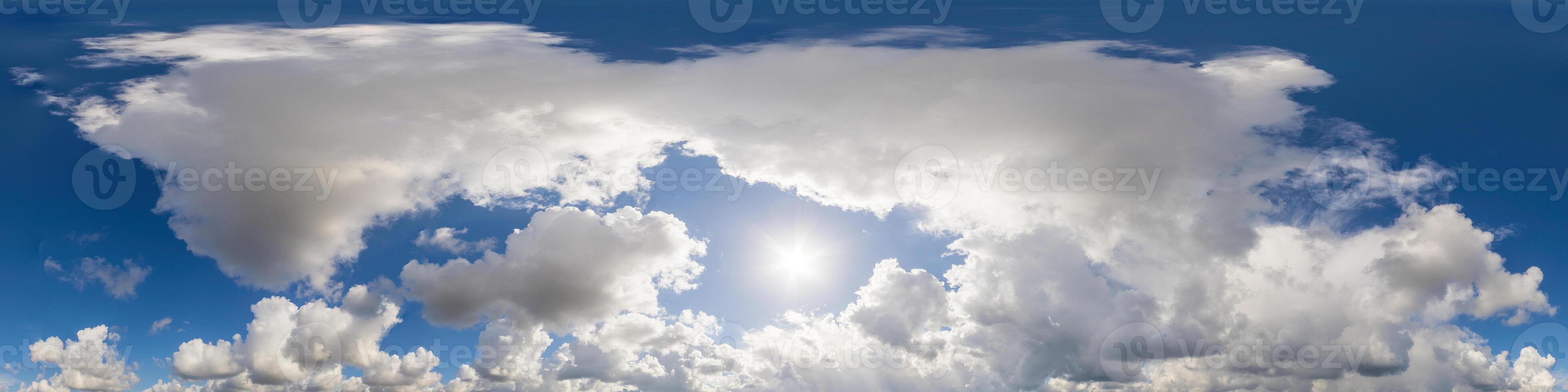 Blue sky panorama with puffy Cumulus clouds. Seamless hdr pano in spherical equirectangular format. Sky dome or zenith for 3D visualization, game and sky replacement for aerial drone 360 panoramas. photo