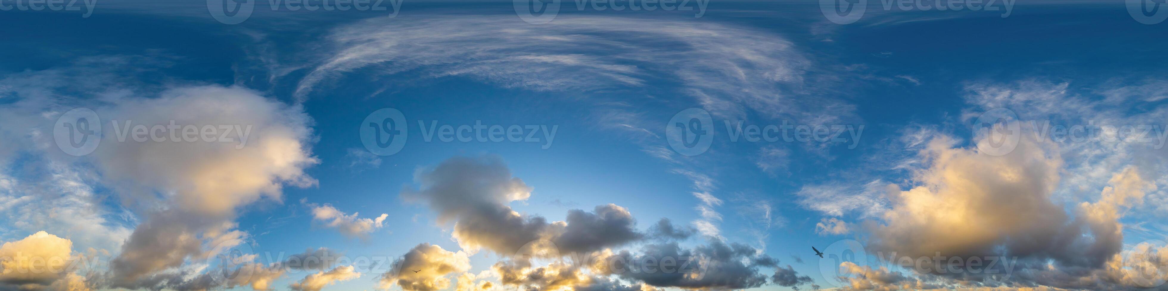 Dark blue sunset sky panorama with Cumulus clouds. Seamless hdr pano in spherical equirectangular format. Complete zenith for 3D visualization, game and sky replacement for aerial drone 360 panoramas. photo