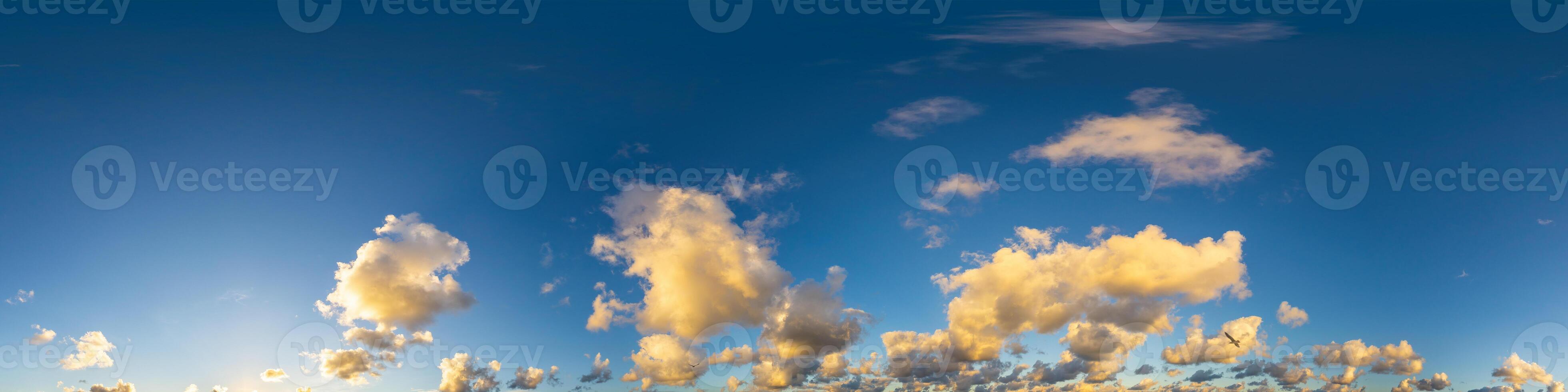Dark blue sunset sky panorama with Cumulus clouds. Seamless hdr pano in spherical equirectangular format. Complete zenith for 3D visualization, game and sky replacement for aerial drone 360 panoramas. photo