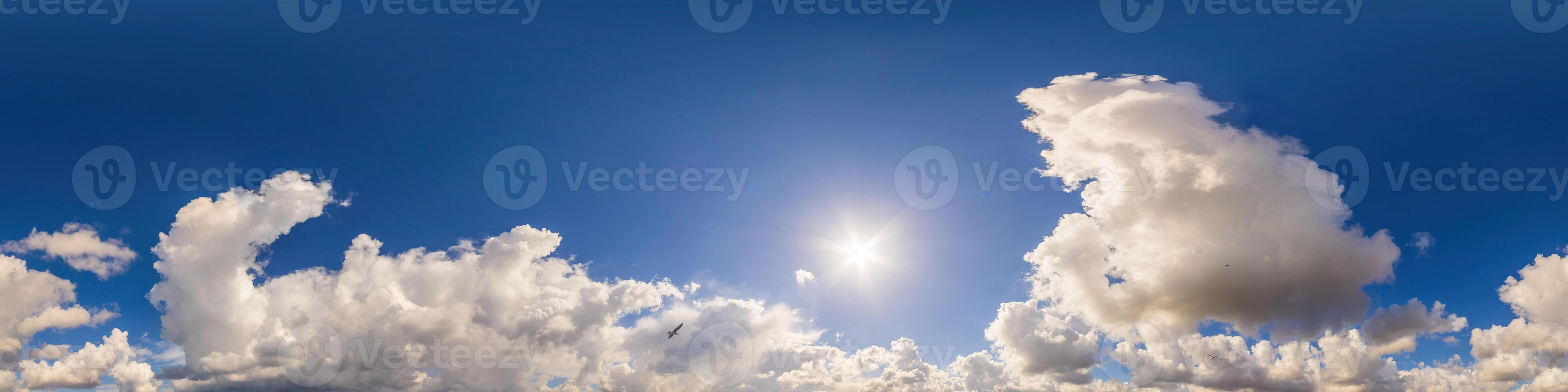 Blue sky panorama with puffy Cumulus clouds. Seamless hdr pano in spherical equirectangular format. Sky dome or zenith for 3D visualization, game and sky replacement for aerial drone 360 panoramas. photo