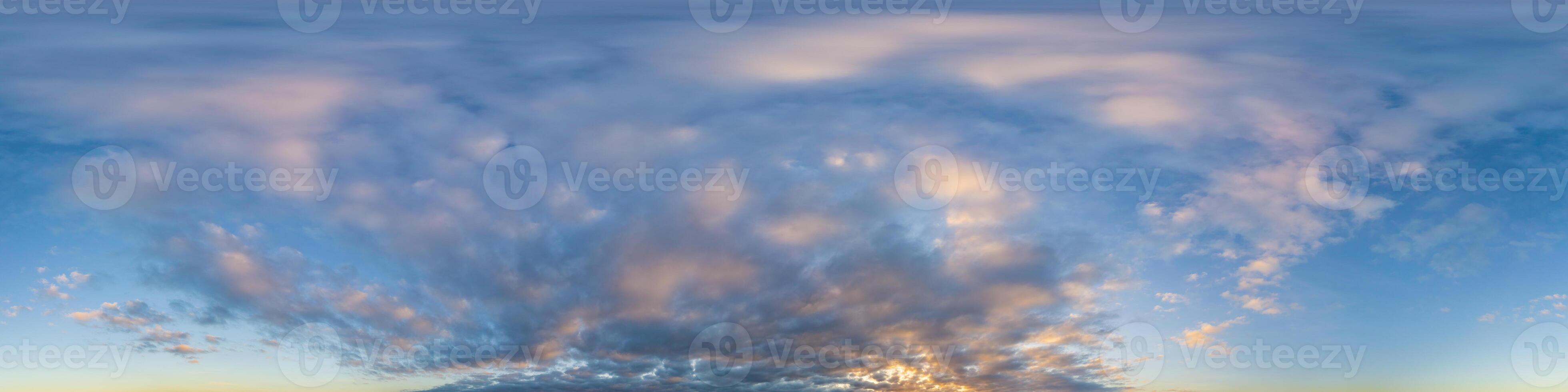 Dark blue sunset sky panorama with Cumulus clouds. Seamless hdr pano in spherical equirectangular format. Complete zenith for 3D visualization, game and sky replacement for aerial drone 360 panoramas. photo