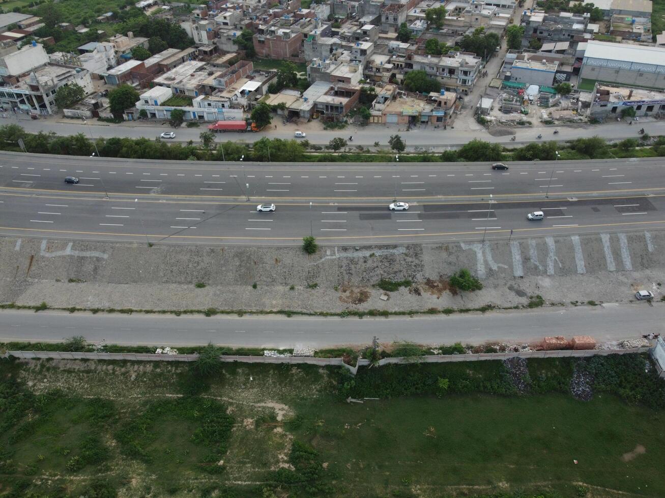 aéreo ver de dha fase-6, principal cuadrado, un pequeño pueblo en 2023-07-18 en lahore Pakistán. foto