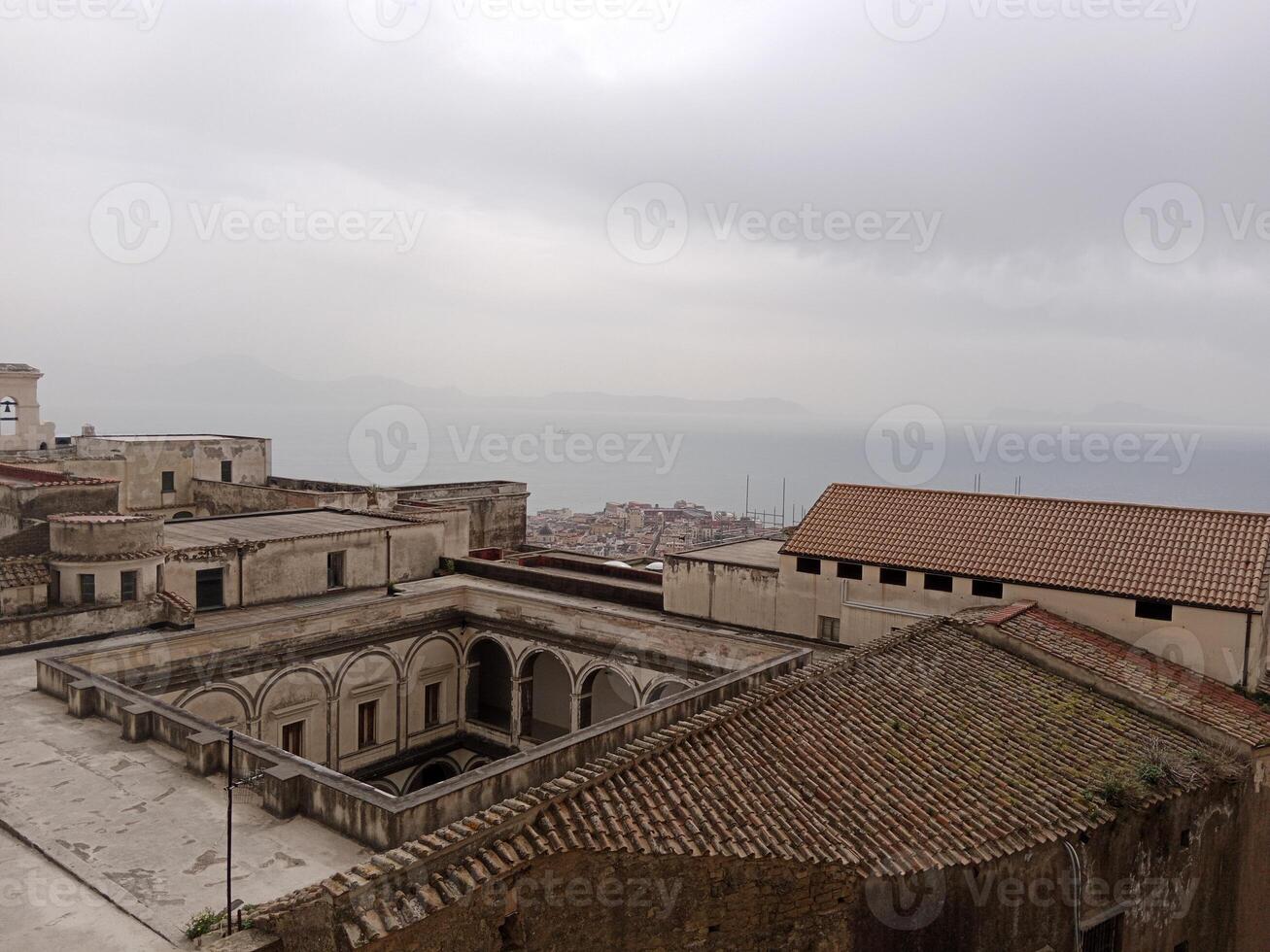 Panorama of Naples from Castel Sant'Elmo offers a breathtaking view of the city's vibrant streets, historic landmarks, and the mesmerizing beauty of the Bay of Naples photo