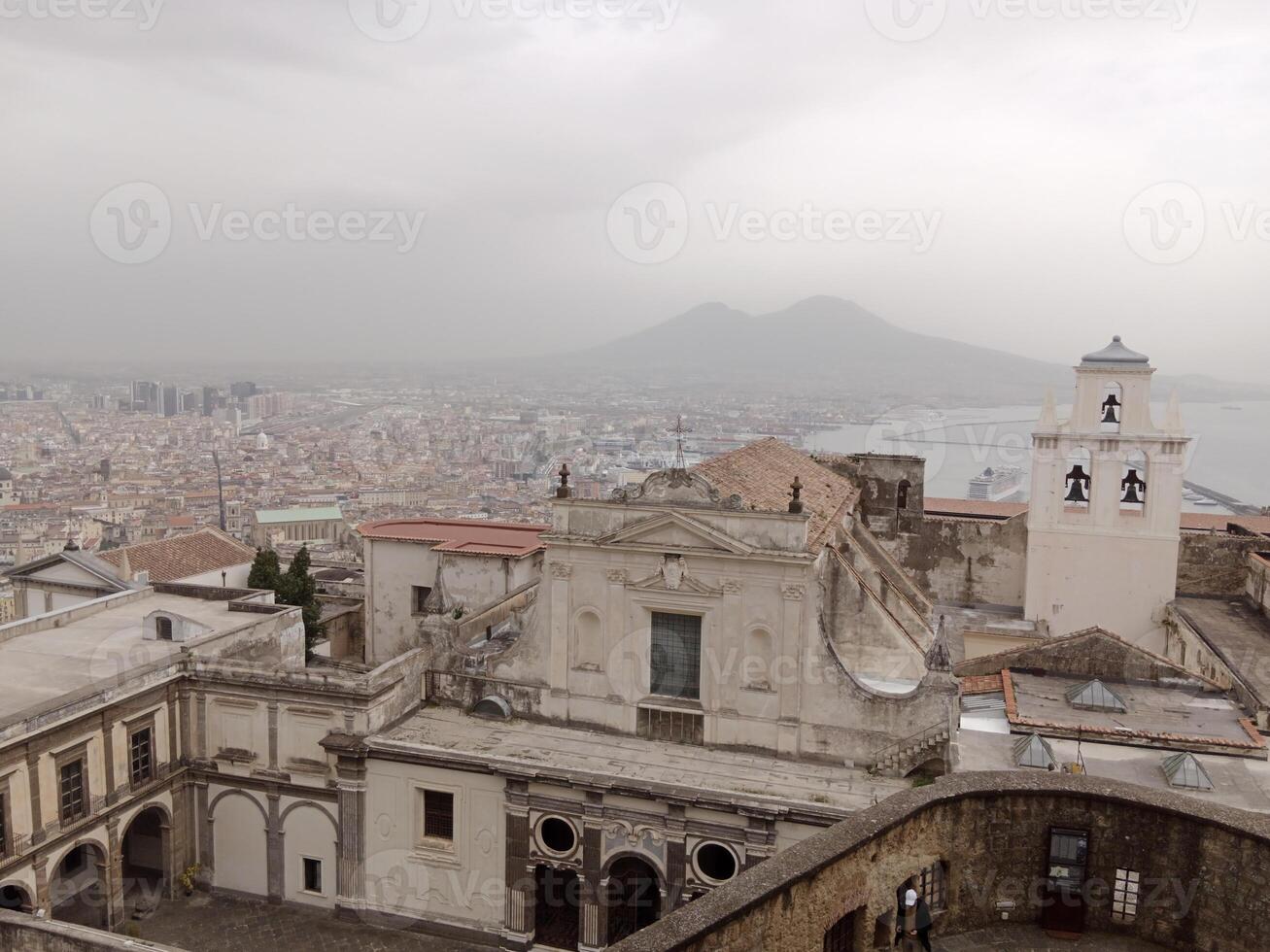 Panorama of Naples from Castel Sant'Elmo offers a breathtaking view of the city's vibrant streets, historic landmarks, and the mesmerizing beauty of the Bay of Naples photo