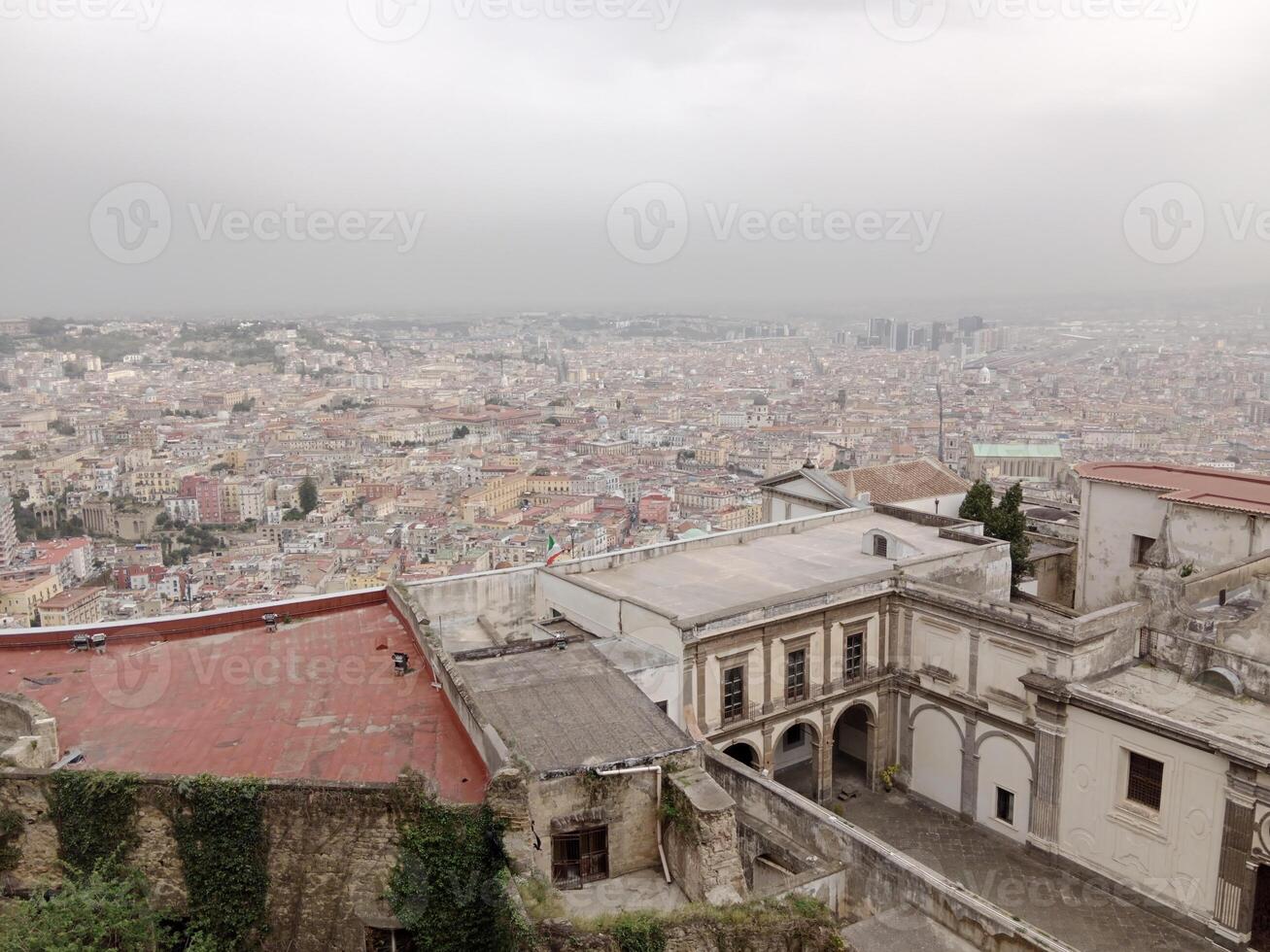 Panorama of Naples from Castel Sant'Elmo offers a breathtaking view of the city's vibrant streets, historic landmarks, and the mesmerizing beauty of the Bay of Naples photo