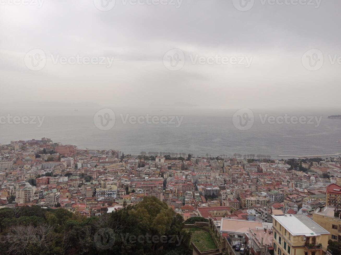 Panorama of Naples from Castel Sant'Elmo offers a breathtaking view of the city's vibrant streets, historic landmarks, and the mesmerizing beauty of the Bay of Naples photo