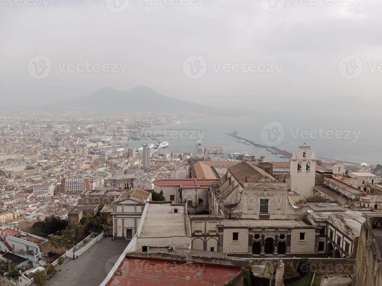 Panorama of Naples from Castel Sant'Elmo offers a breathtaking view of the city's vibrant streets, historic landmarks, and the mesmerizing beauty of the Bay of Naples photo