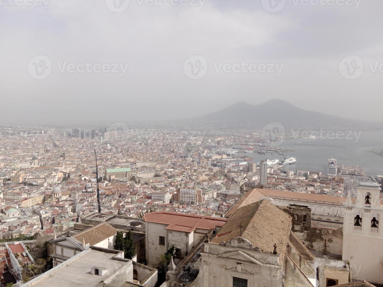 Panorama of Naples from Castel Sant'Elmo offers a breathtaking view of the city's vibrant streets, historic landmarks, and the mesmerizing beauty of the Bay of Naples photo