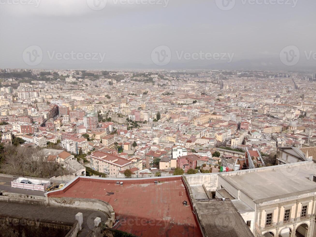 Panorama of Naples from Castel Sant'Elmo offers a breathtaking view of the city's vibrant streets, historic landmarks, and the mesmerizing beauty of the Bay of Naples photo