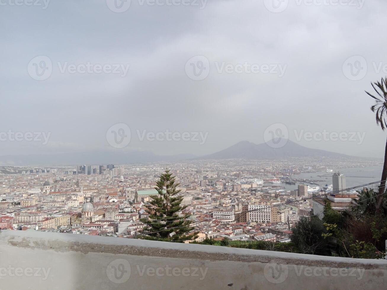 Panorama of Naples from Castel Sant'Elmo offers a breathtaking view of the city's vibrant streets, historic landmarks, and the mesmerizing beauty of the Bay of Naples photo