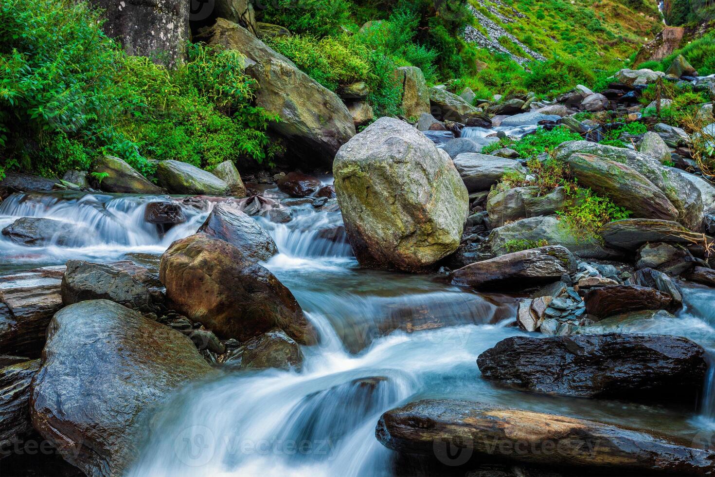 Tropical waterfall. Bhagsu, Himachal Pradesh, India photo