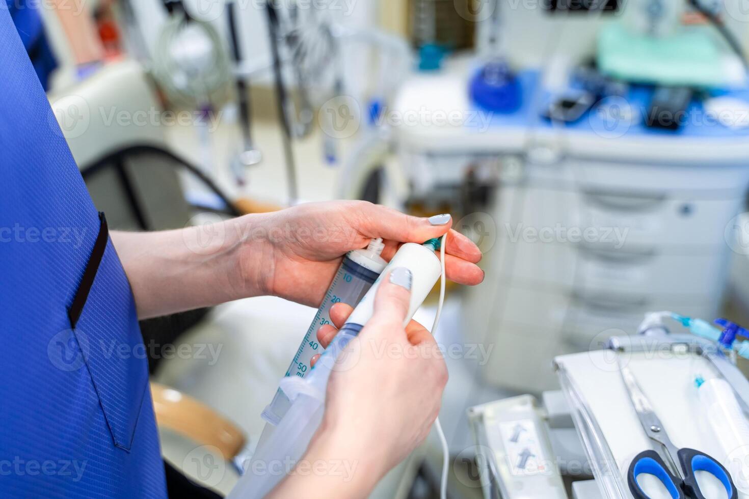 Epidemiology. Syringes and droppers on the background of a operating room. Treatment of the epidemic. Work on the cure of the virus. Dangerous virus antidote photo