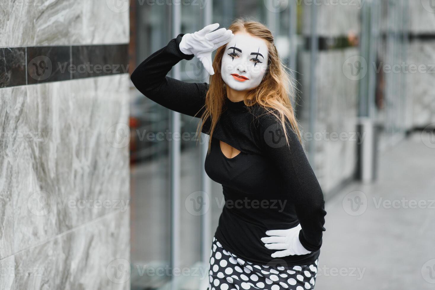 The girl with makeup of the mime. improvisation. photo