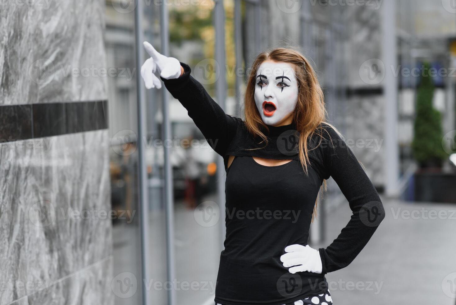 The girl with makeup of the mime. improvisation. photo