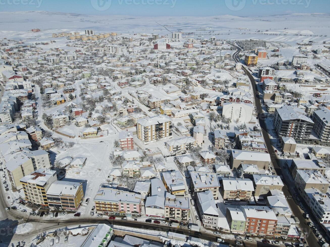 Top view from a drone of a snowy city. Sarikaya,Yozgat,Turkey photo