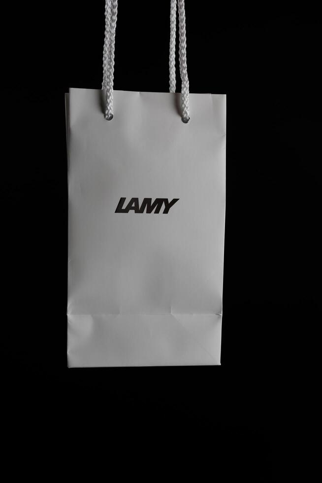 Bangkok, Thailand - March 18, 2024 Paper bag with silver Lamy icon logo. Lamy pen Germany Brand photo