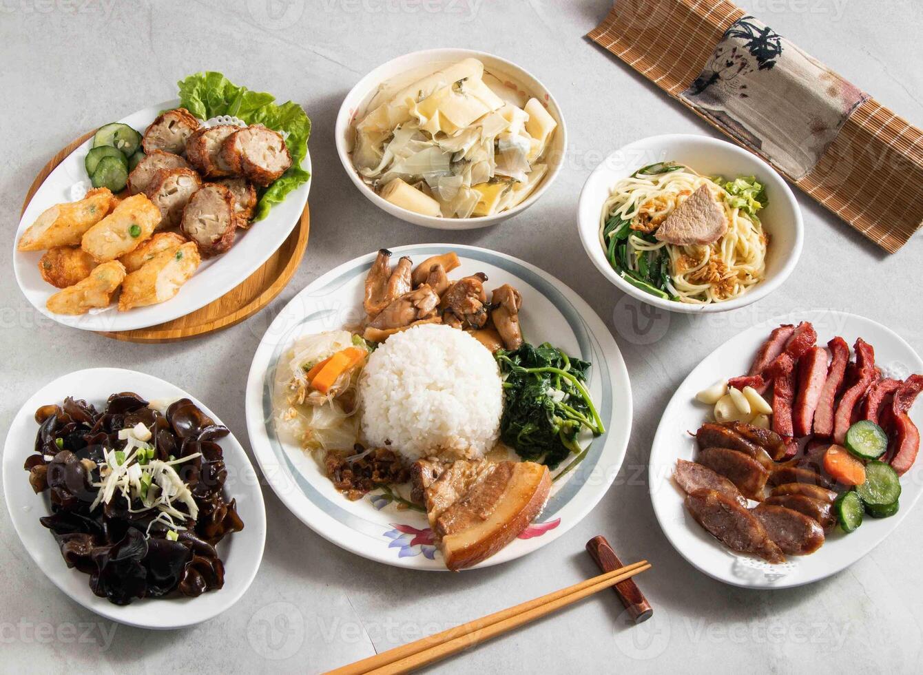 Taiwan food variety Pork Rice Bento, Cold fungus, Signature Double Flavor Platter, Shrimp Meatloaf, Ancient Braised Bamboo Shoots, Danzi noodles photo