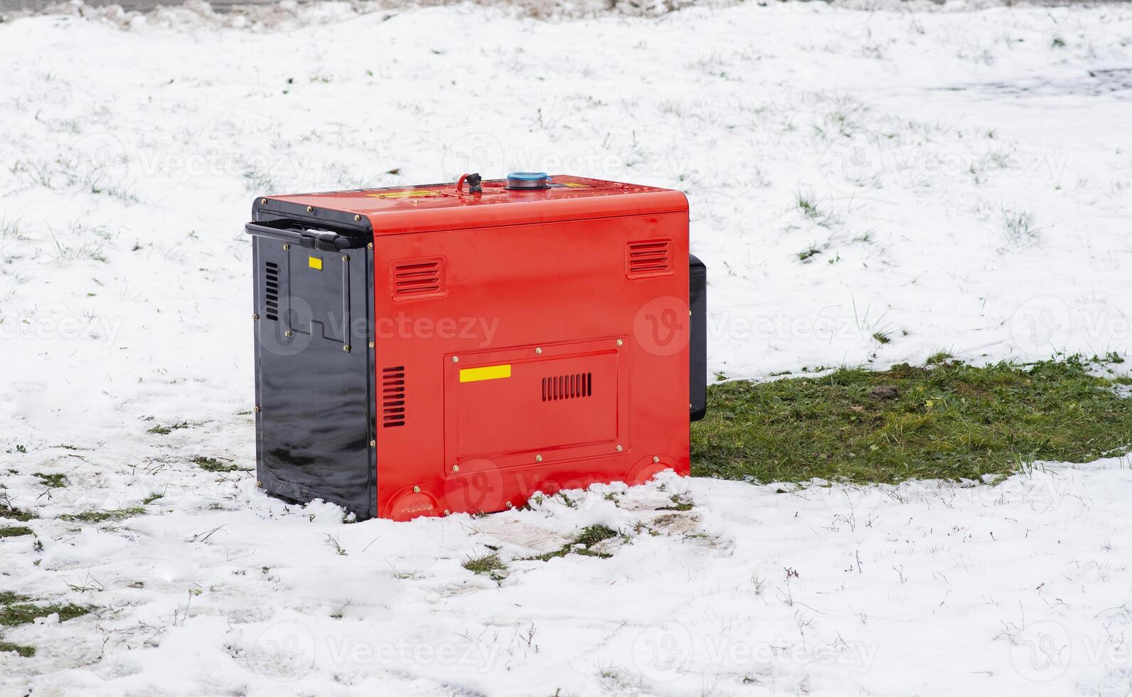 Portable electric generator running in the cold winter.Energy genocide. Power outage as a result of missile strikes by Russia on energy facilities of Ukraine. Small business use gasoline generators. photo