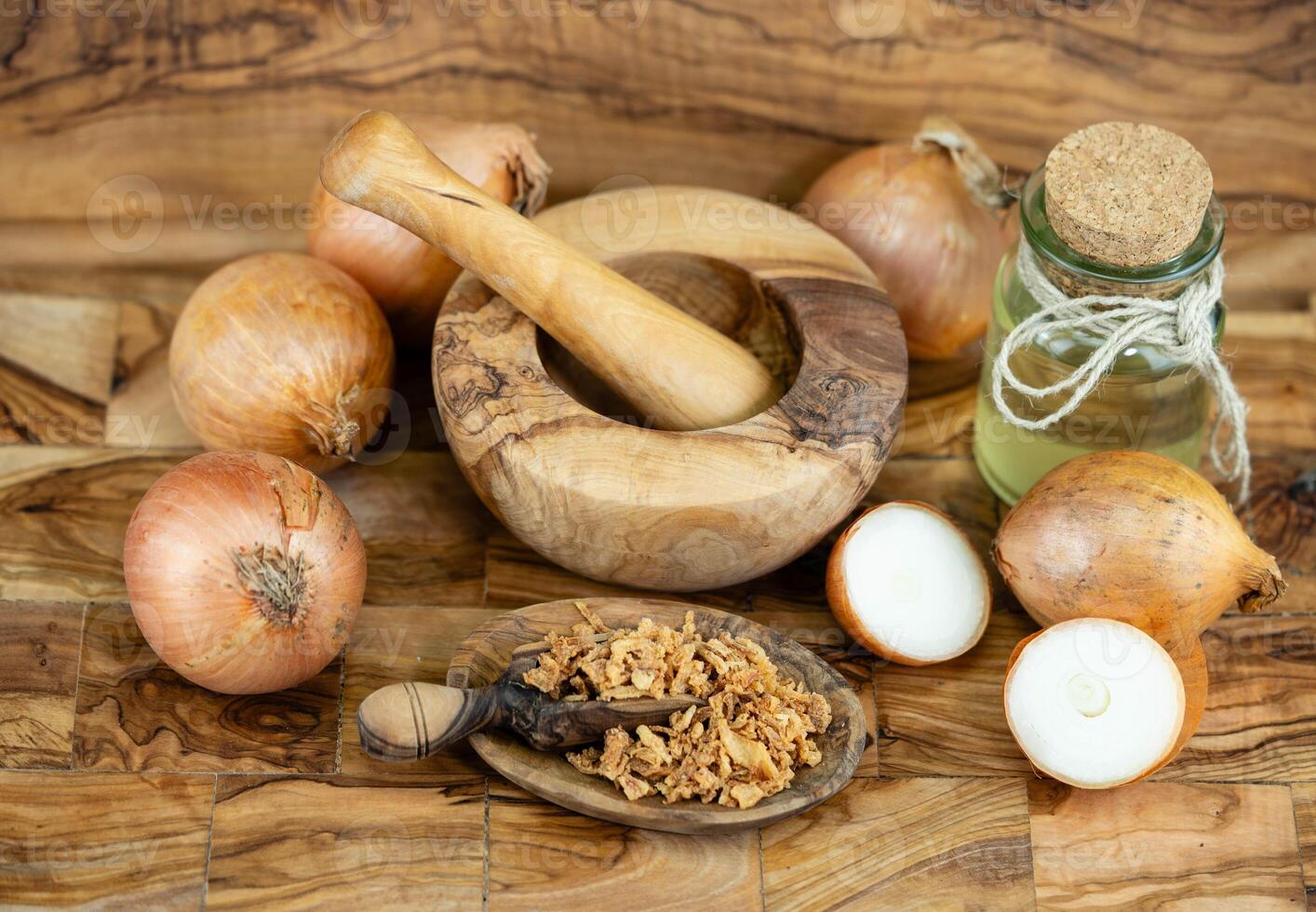 roasted onions on olive wood photo