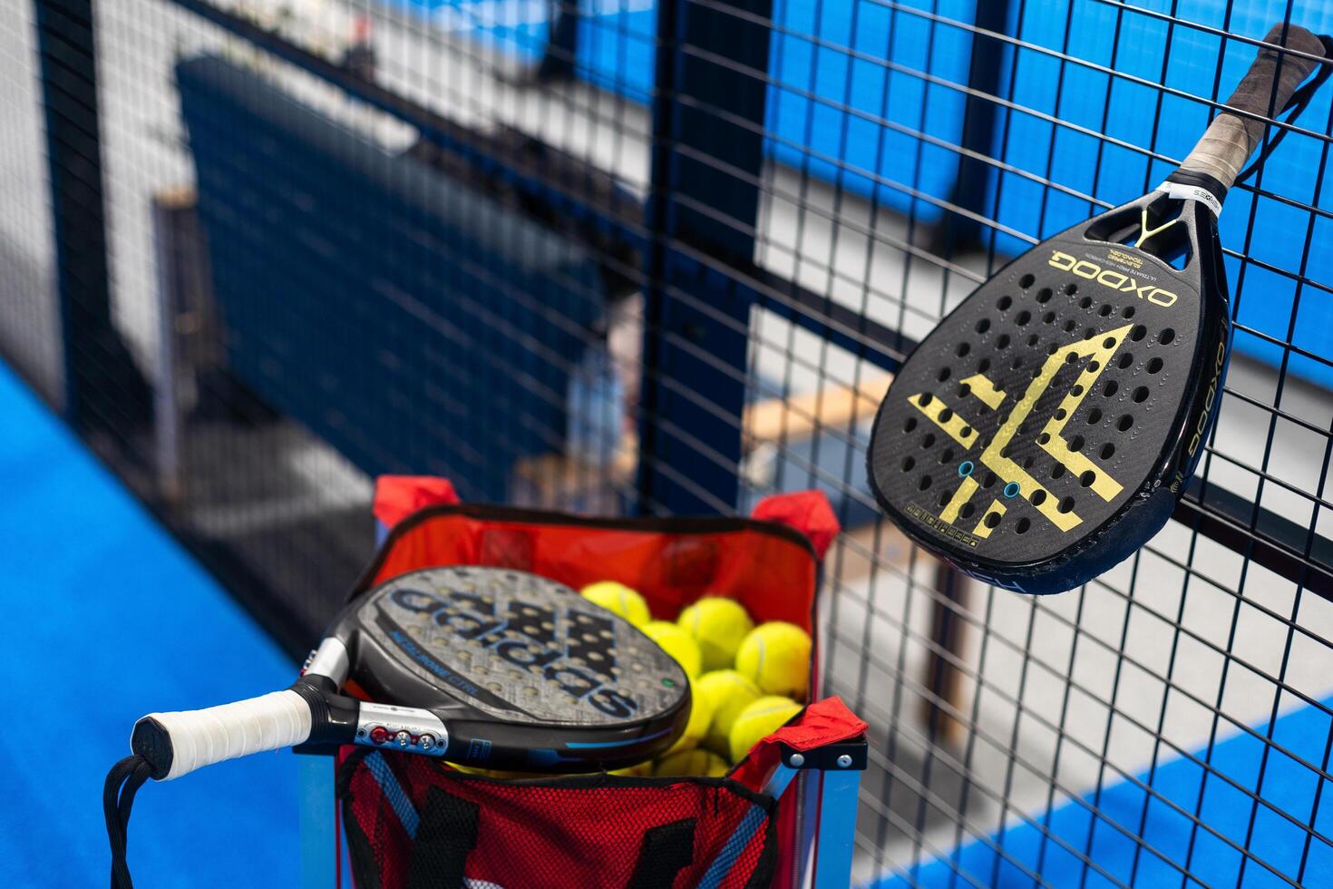 Kyiv, Ukraine. March 22, 2024, Paddle tennis rackets on the court photo