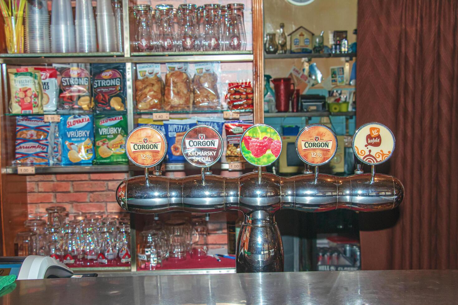 Nitra, Slovakia - 06.14.2022 Bar counter in the Slovak Corgon beer bar. photo