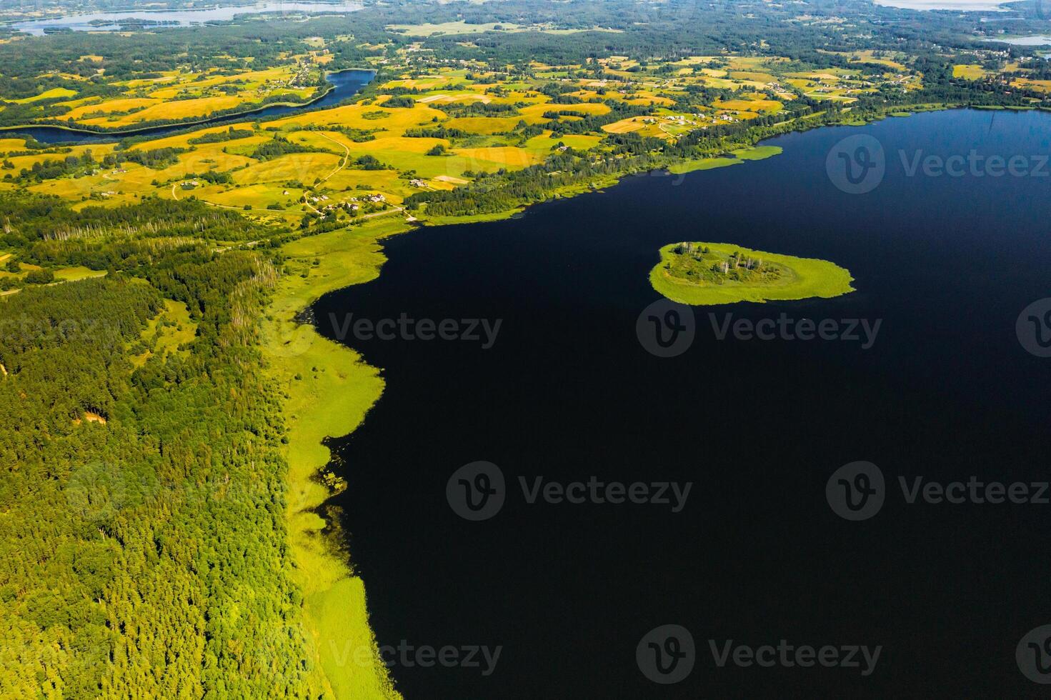 Top view of lake Drivyaty in the Braslav lakes National Park, the most beautiful lakes in Belarus.An island in the lake.Belarus. photo