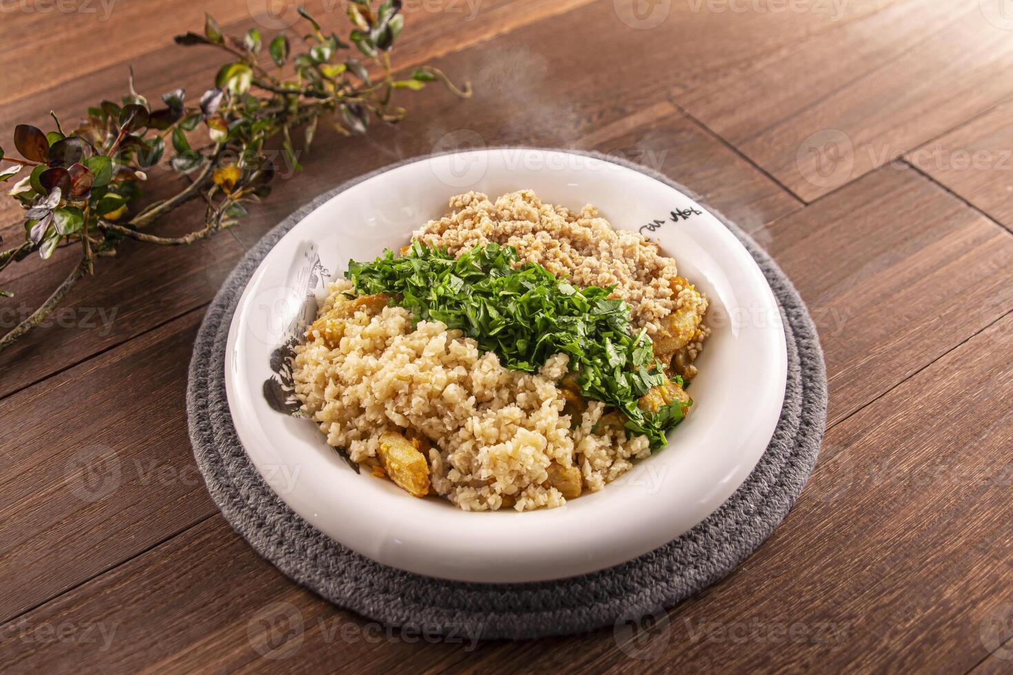 Xiang Wei Lao Eggplant with Minced Meat, Salted Egg Yolk, Minced Garlic, Chopped Coriander served dish isolated on wooden table top view of Hong Kong food photo