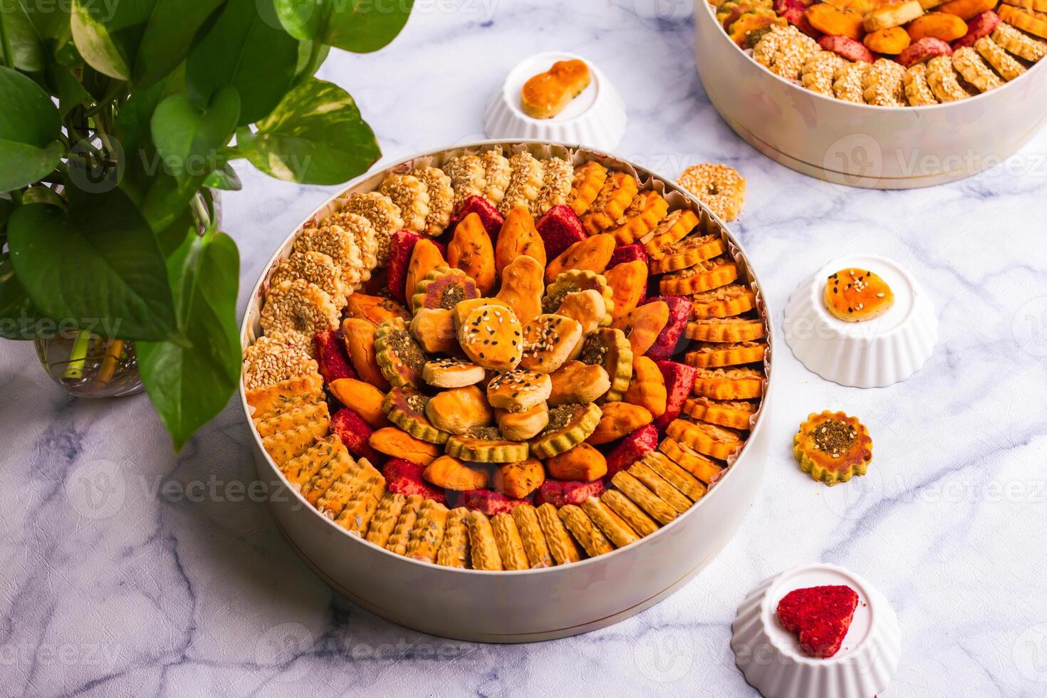 Assorted salted biscuits served in a dish isolated on grey background top view of snackss photo