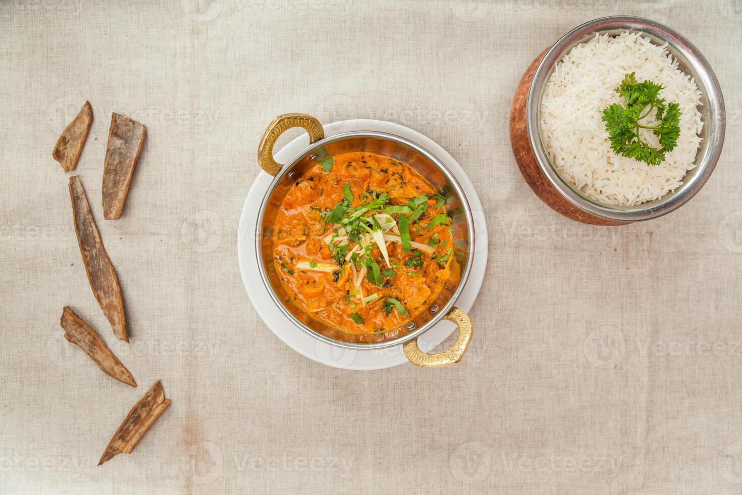 Lamb mughlai with white rice served in a dish isolated on table top view of indian spices food photo
