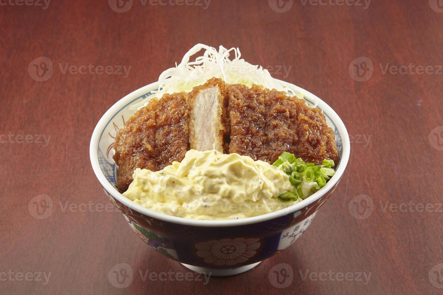 Tar Tar Katsu Don served in a dish isolated on wooden table background side view of singapore food photo