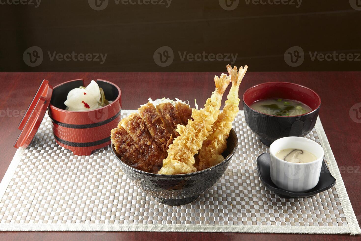 Sauce Katsu and Ebi Manzoku Don served in a dish isolated on wooden table background side view of singapore food photo