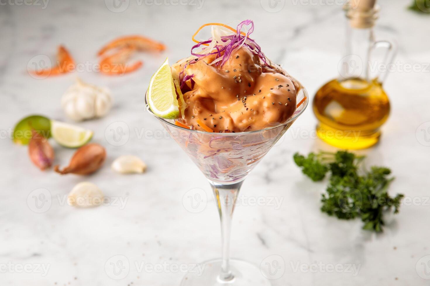 DYNAMITE SHRIMP served in a goblet isolated on wooden table background side view of appetizer photo