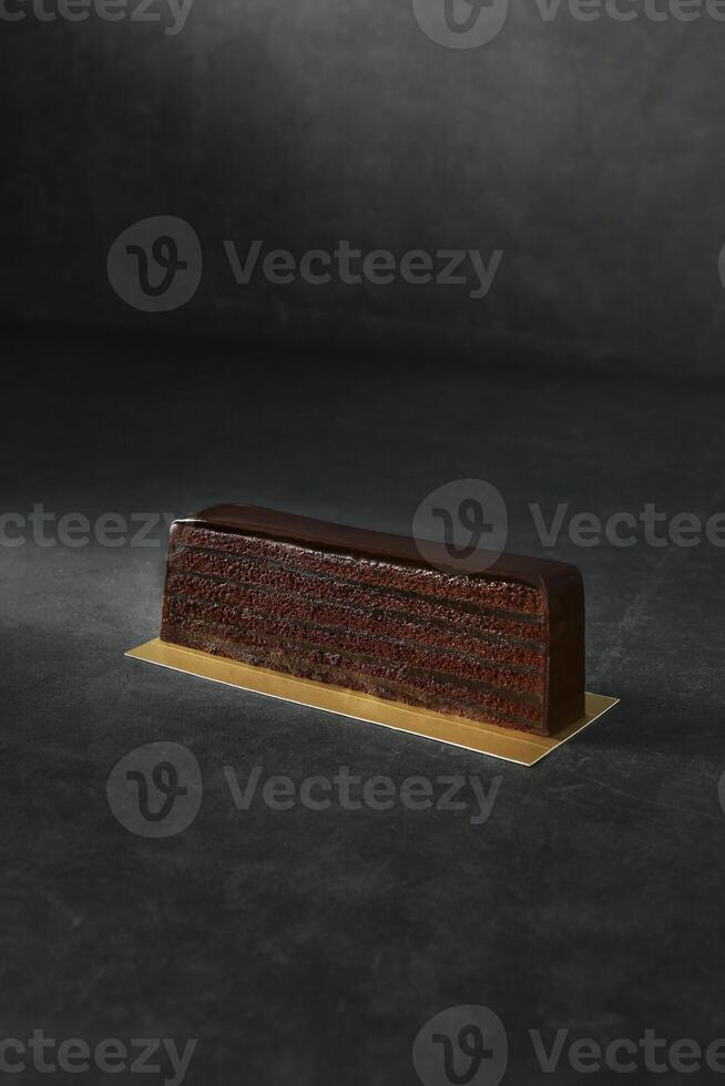 Superstacked Chocolate Cake isolated on dark background top view of baked item dessert photo