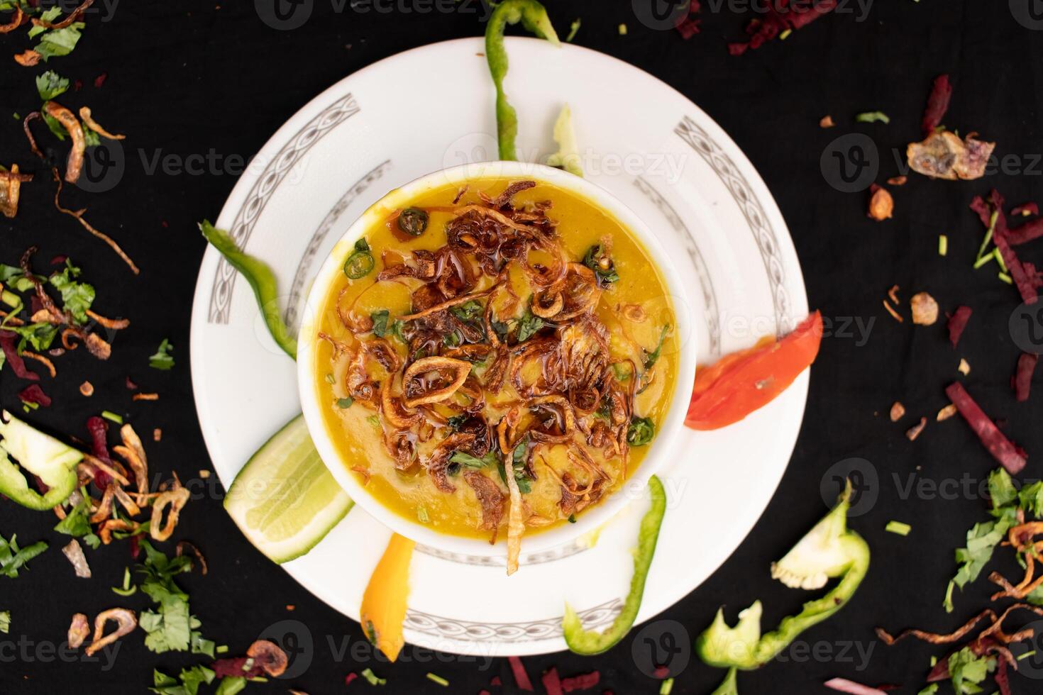 Beef Haleem or halim and daleem served in dish isolated on dark background top view of indian spices food photo