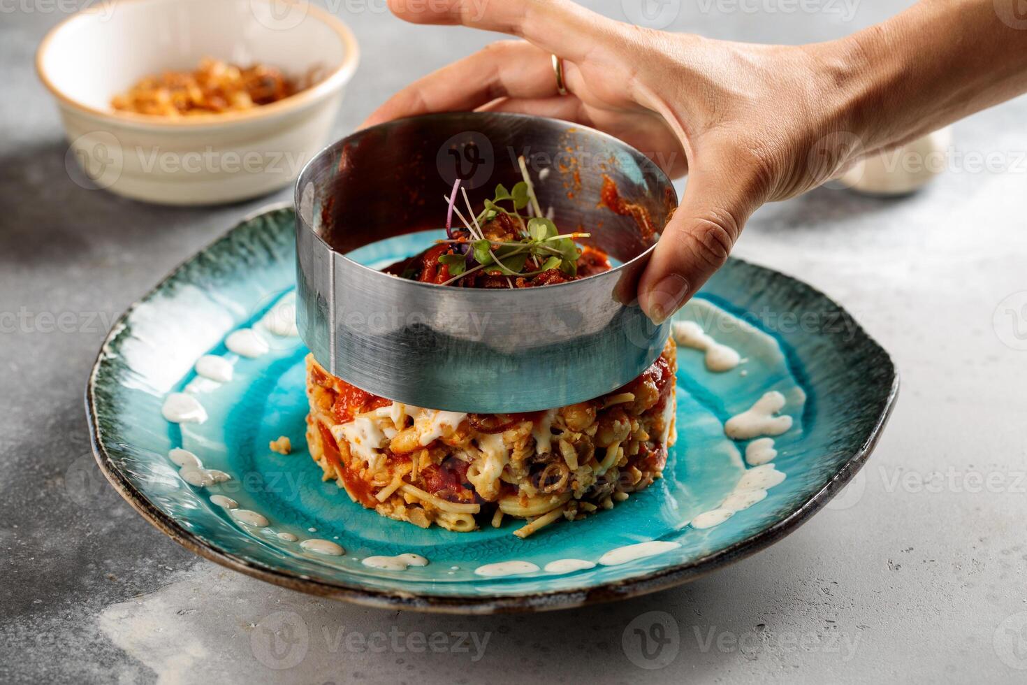 Kushari served in dish isolated on table top view of arabic breakfast photo