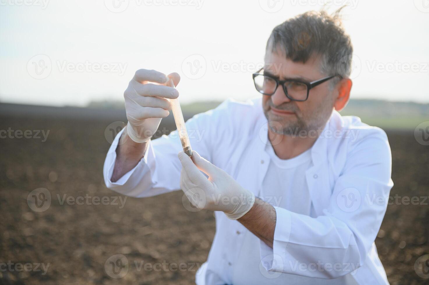 POV view of farmer owner control soil quality before seed plant. Future agriculture concept. photo