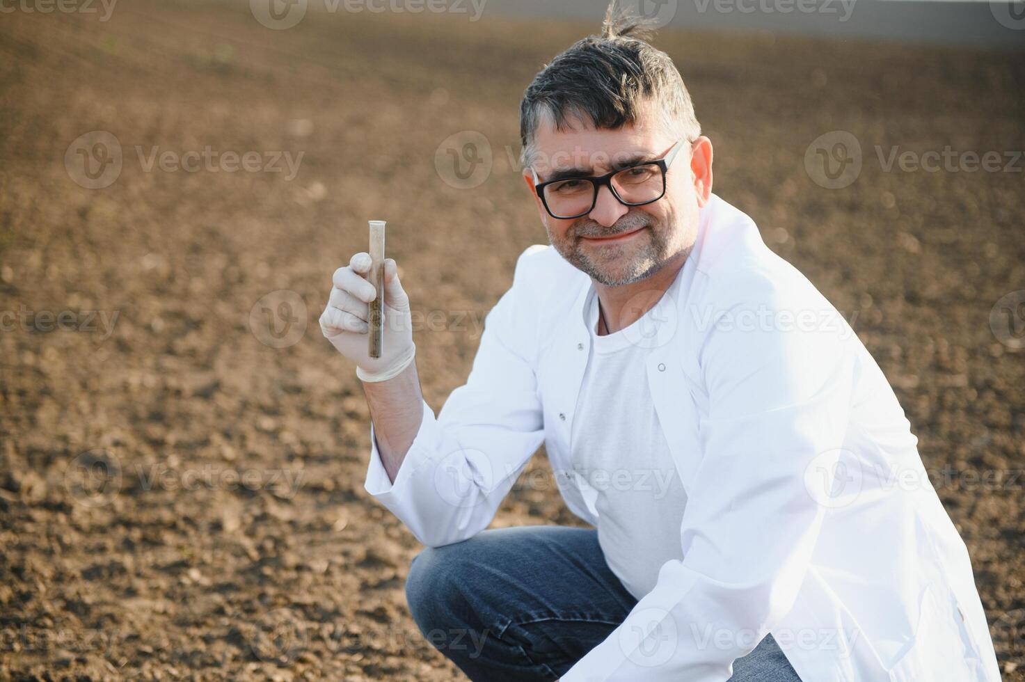 POV view of farmer owner control soil quality before seed plant. Future agriculture concept. photo