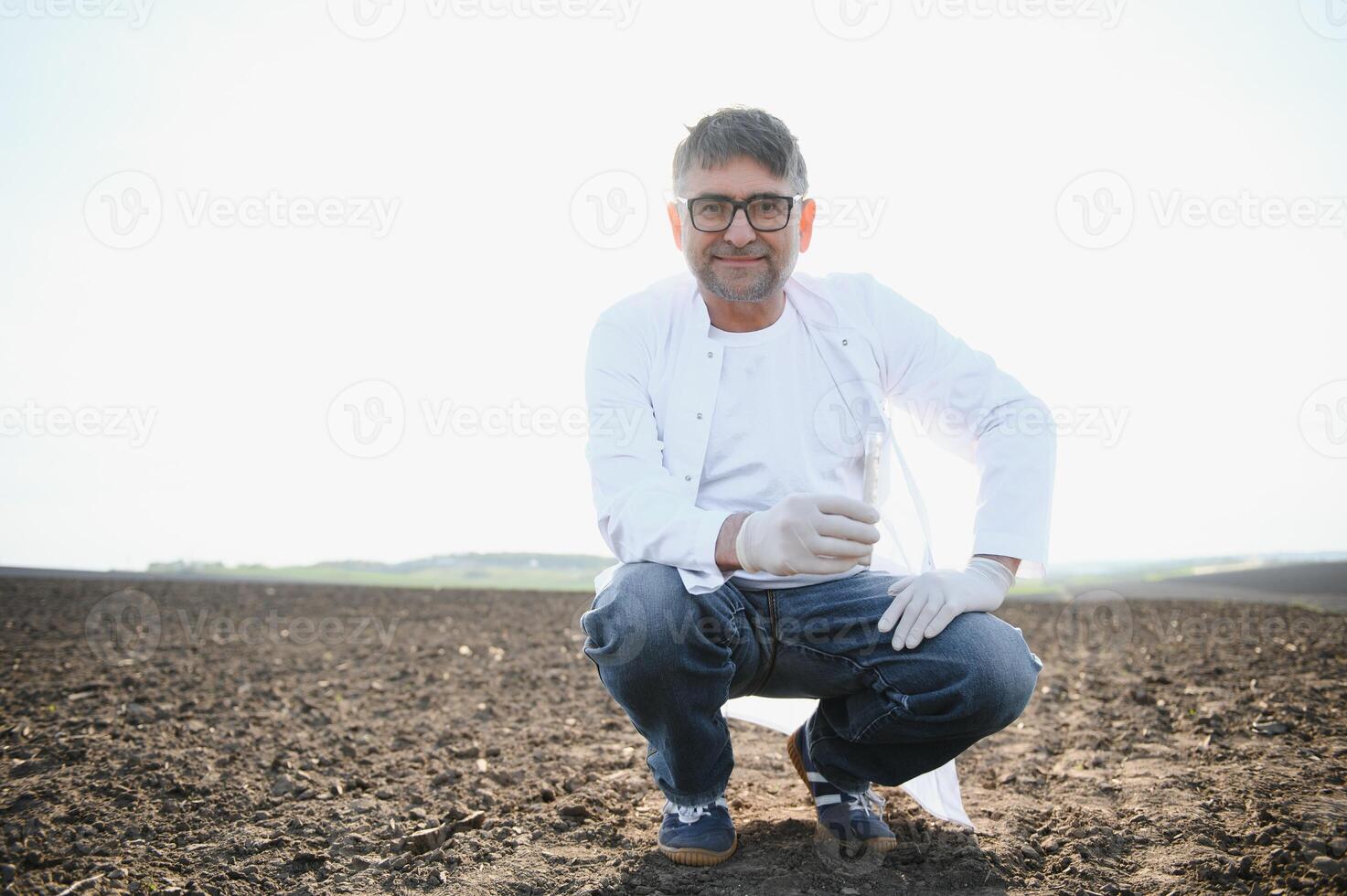 POV view of farmer owner control soil quality before seed plant. Future agriculture concept. photo