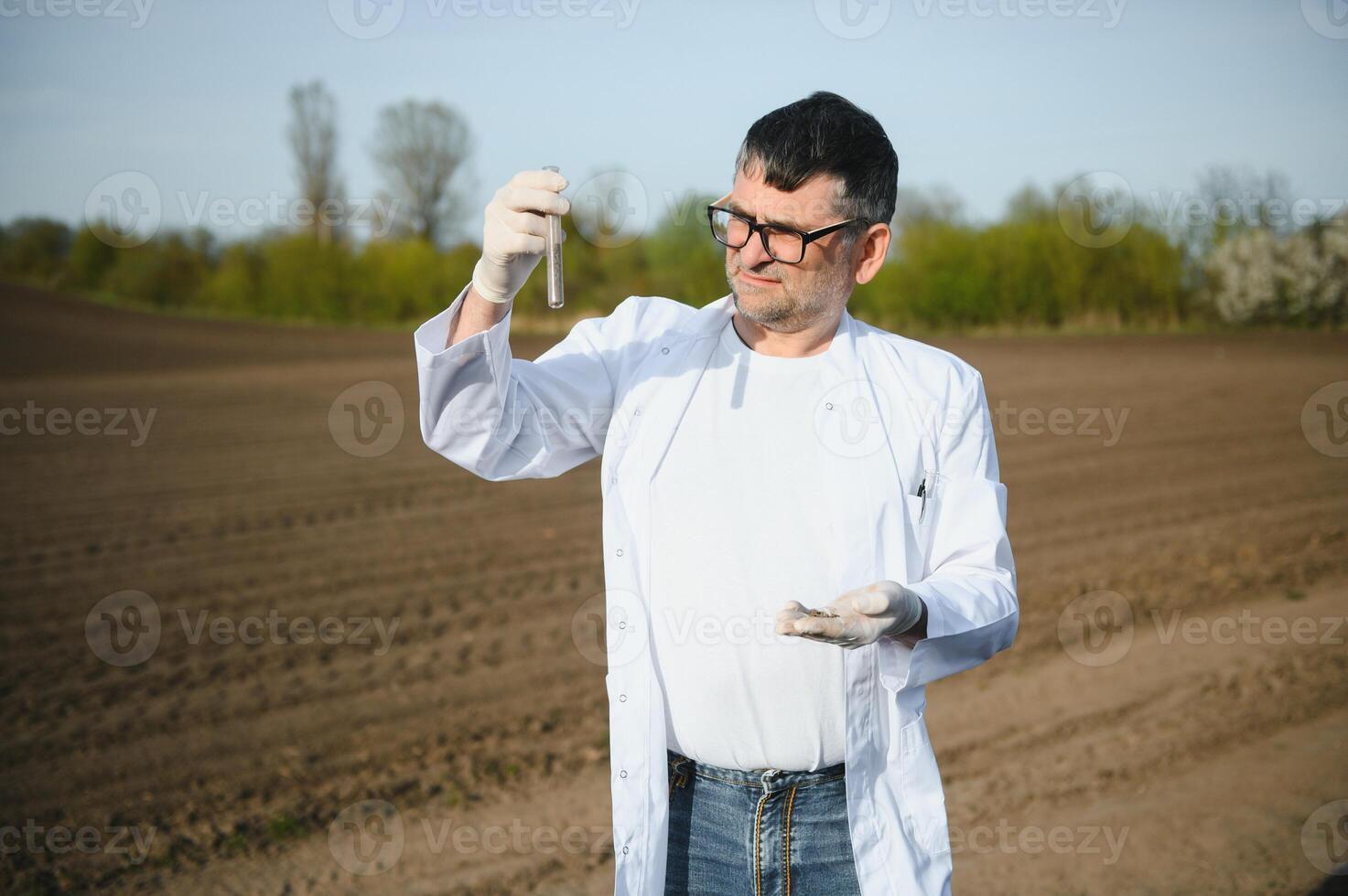 POV view of farmer owner control soil quality before seed plant. Future agriculture concept. photo