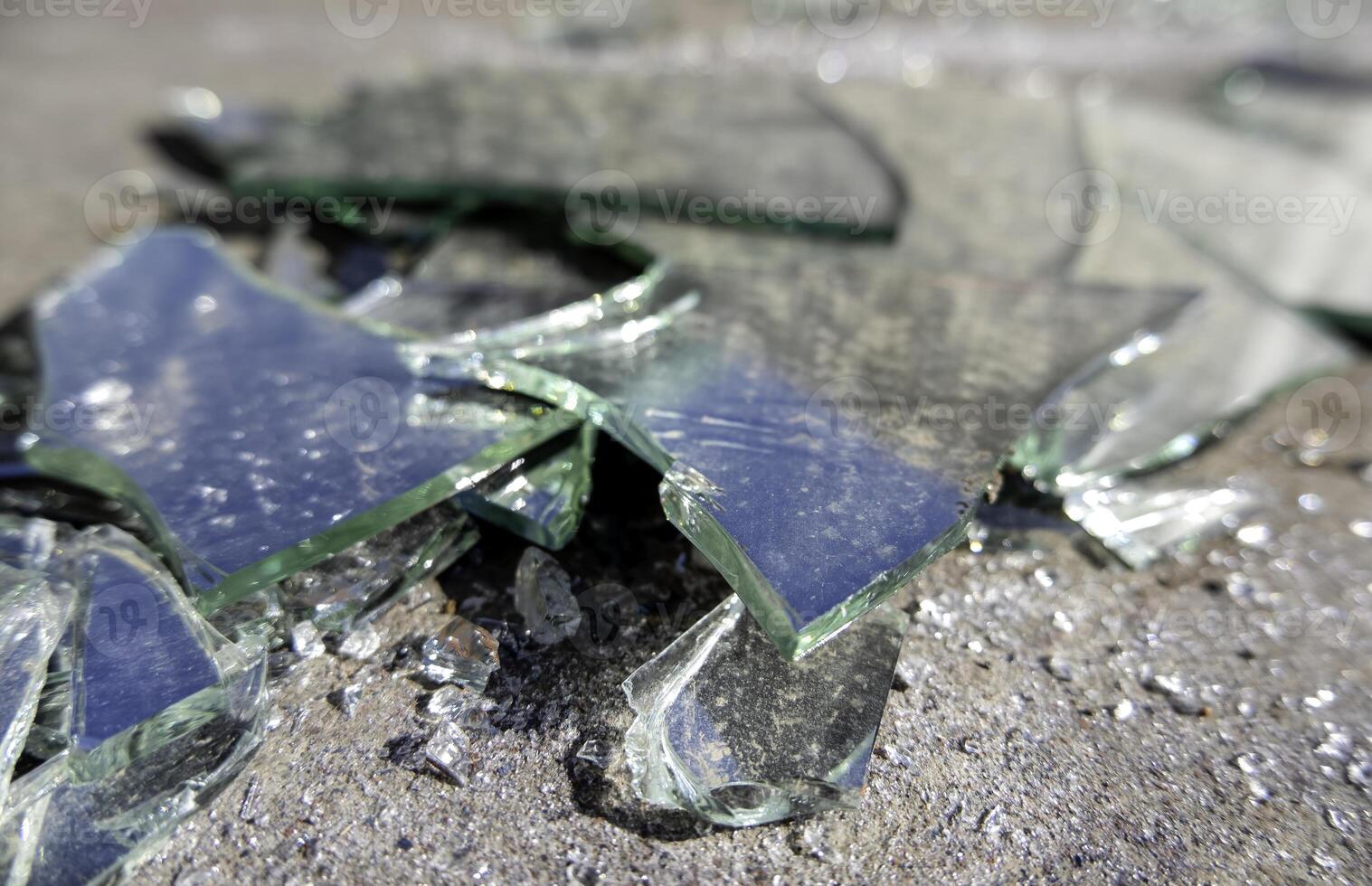 Broken glass on the floor photo