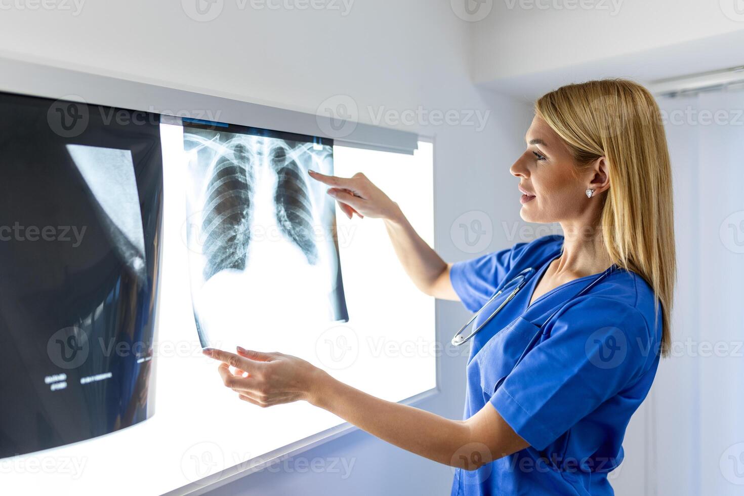 radiology and medicine concept. doctor explaining the results of scan lung on screen to senior patient. photo