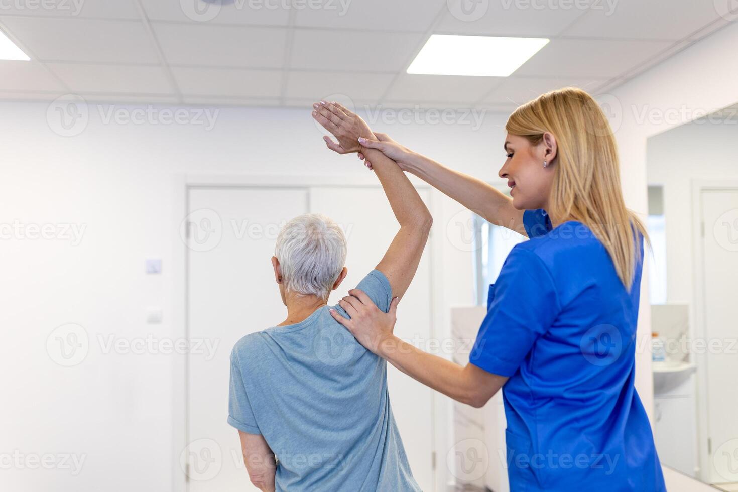 Patient stretching, physiotherapist woman and physical therapy help for muscle or arthritis exercise in consulting exam. Physiotherapy, chiropractor and healthcare rehabilitation support of woman photo