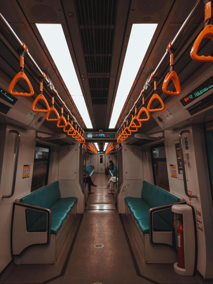 Palembang, Indonesia, June 16, 2022. Empty train waiting at the LRT station photo