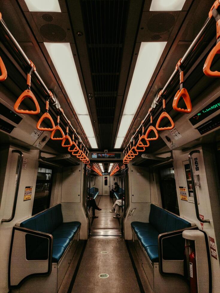 Palembang, Indonesia, June 16, 2022. Empty train waiting at the LRT station photo