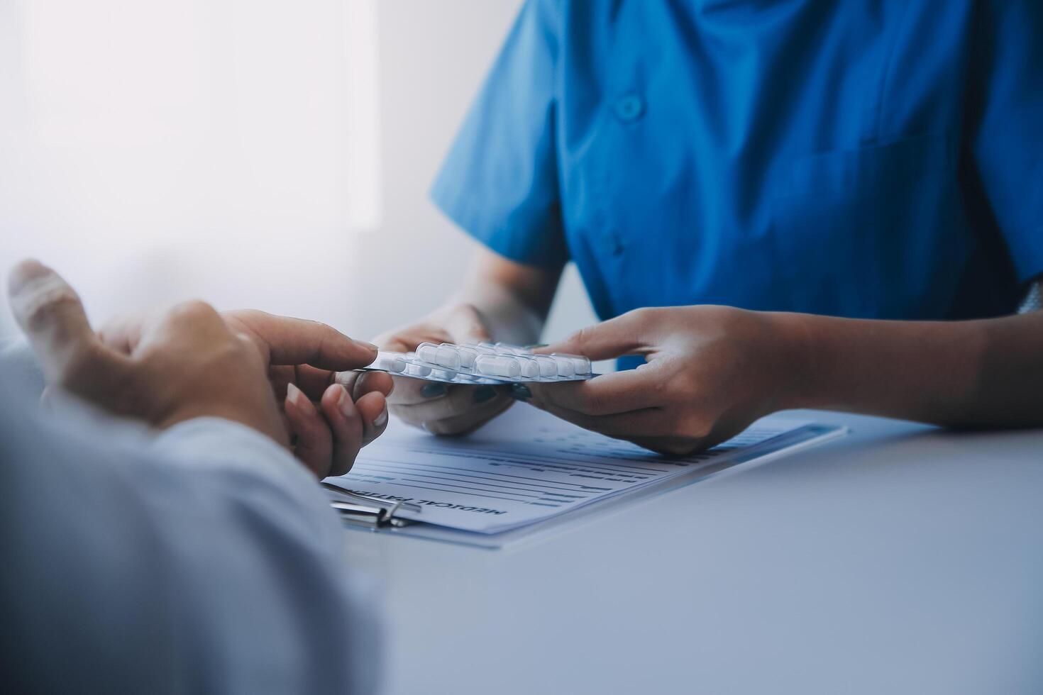 Doctor and patient are discussing consultation about symptom problem diagnosis of disease talk to the patient about medication and treatment method. photo