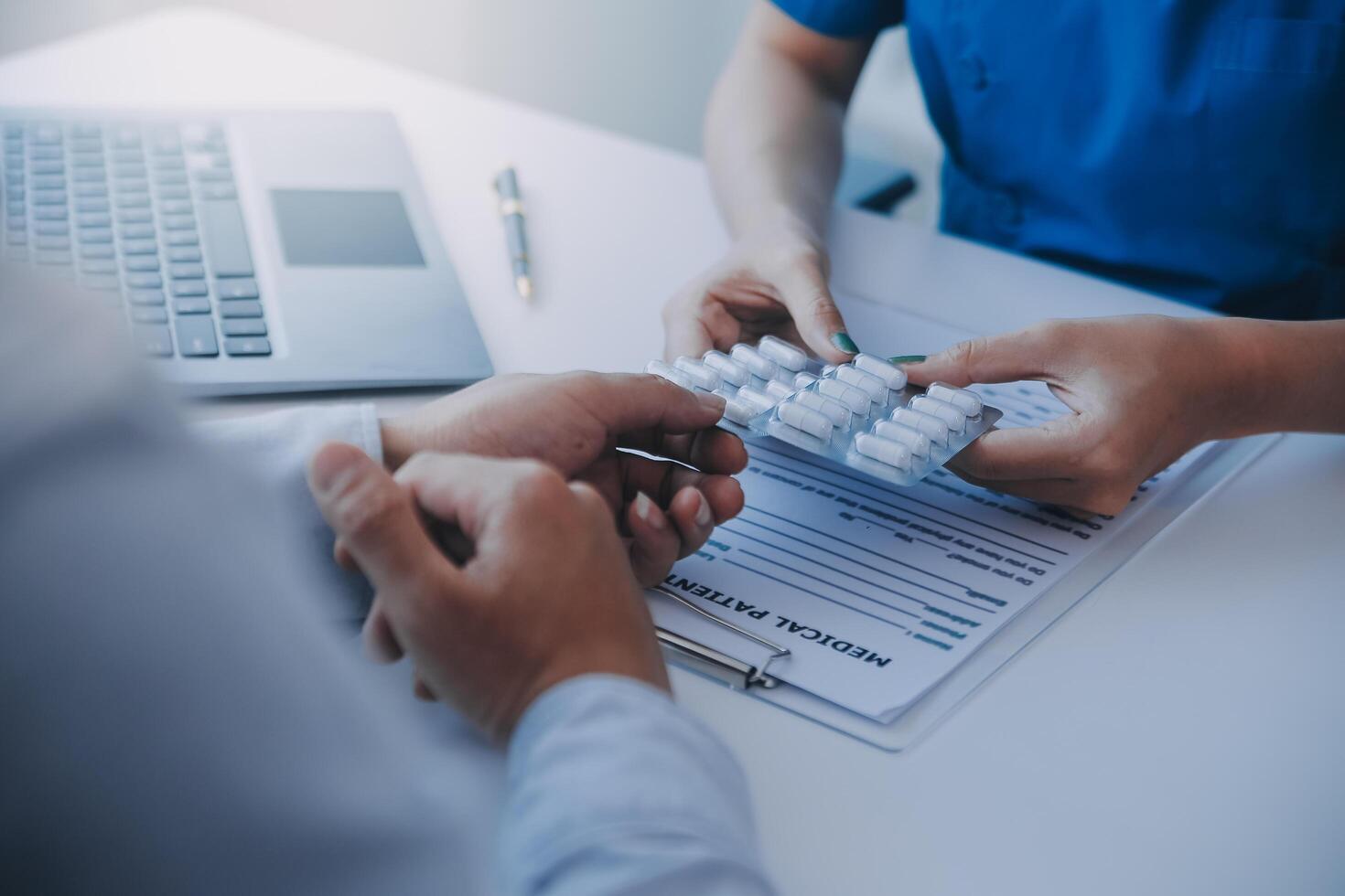 Doctor and patient are discussing consultation about symptom problem diagnosis of disease talk to the patient about medication and treatment method. photo