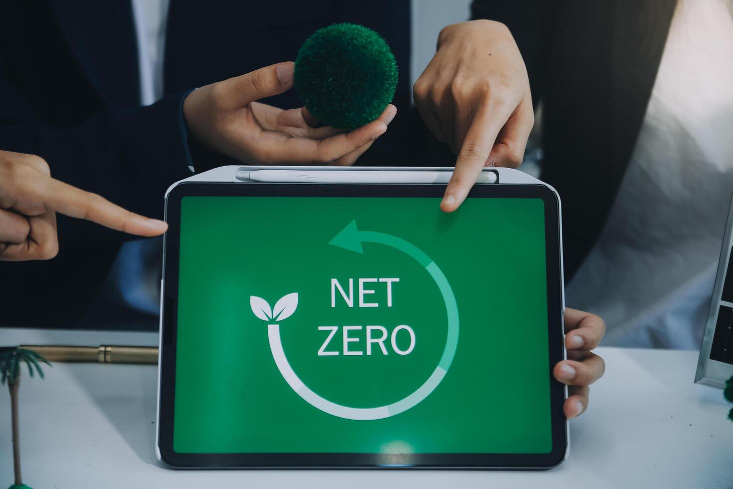 Carbon offset price report CO2 emission. Future growth Net zero waste in ESG ethical SME office protect climate change global warming social issues project. Group of asia people Eco friendly SDGs plan photo