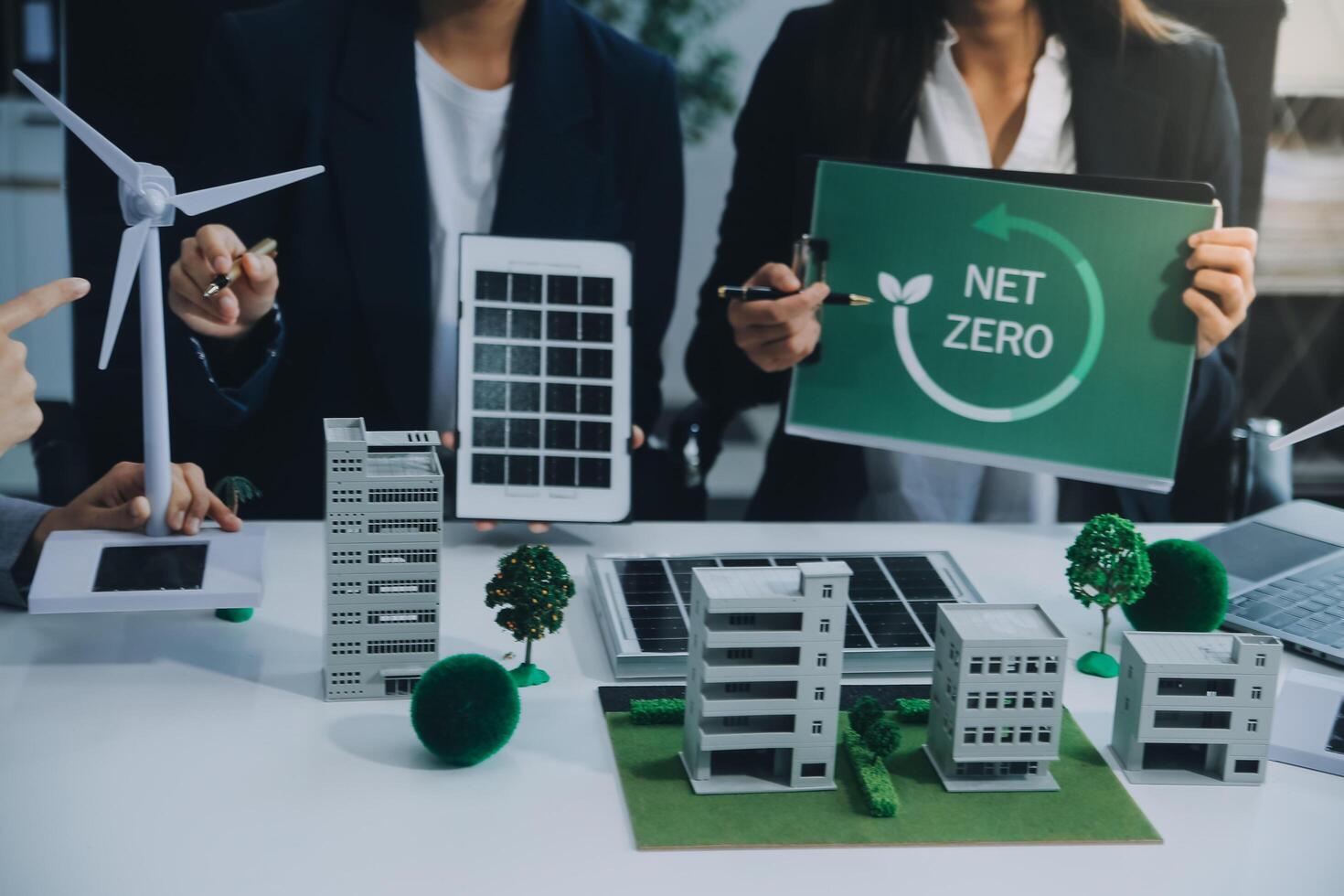 Carbon offset price report CO2 emission. Future growth Net zero waste in ESG ethical SME office protect climate change global warming social issues project. Group of asia people Eco friendly SDGs plan photo